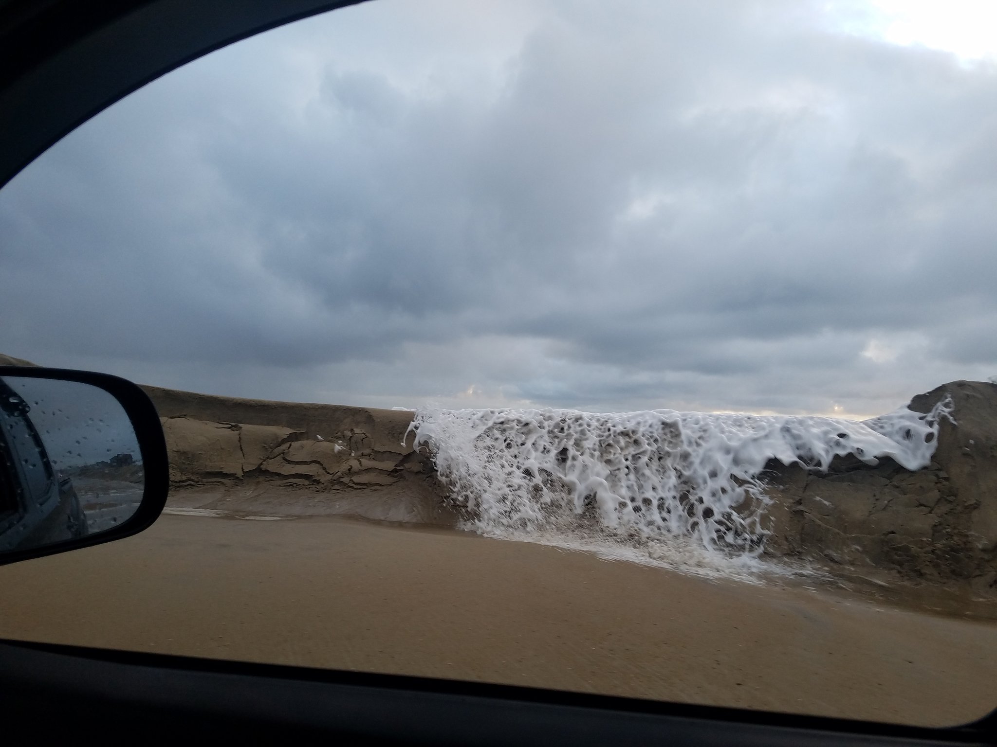 Dune breach north of Rodanthe, NC. Photo by Michael Flynn Dune breach north of Rodanthe, NC