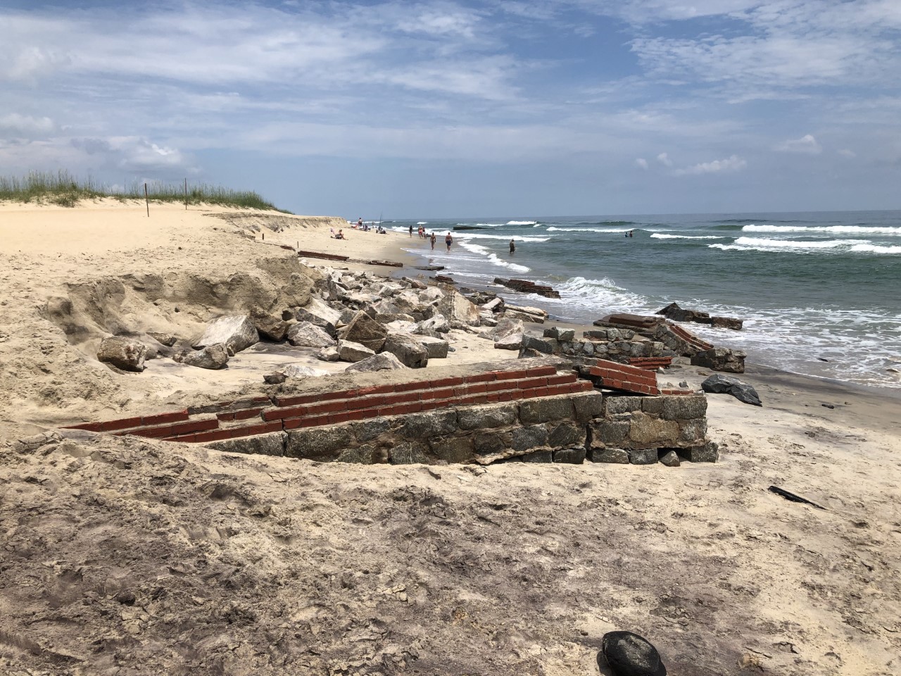 Exposed Lighthouse Fence Foundation 7-1-2020 Photo of an old exposed lighthouse fence on July 1, 2020.