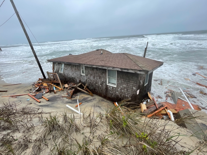 Photo of collapsed one-story house at 23228 East Point Drive, Rodanthe.