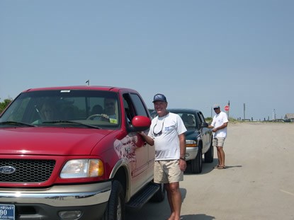 NCBBA Members distribute information, free trash bags and helpful beach driving hints during "Operation Beach Respect"