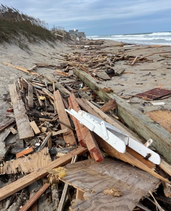 Collection of house collapse debris located south of G A Kohler Court in Rodanthe Collection of house debris on the beach.