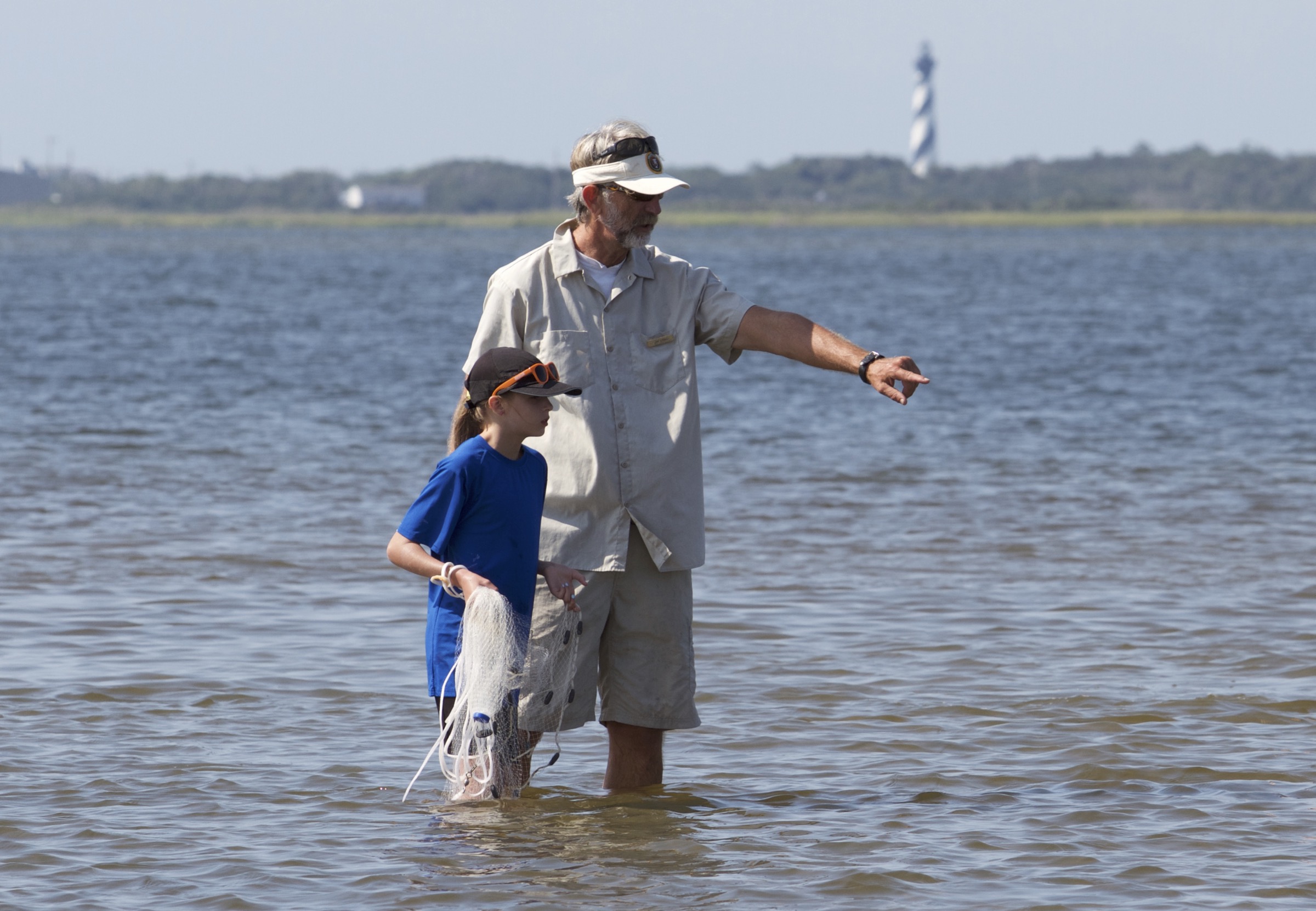 Jim Lyons with Cape Hatteras Lighthouse in background