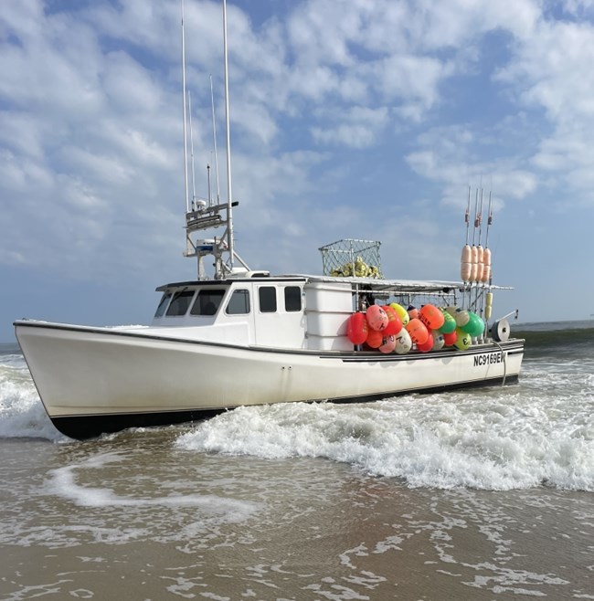 Photo of a grounded vessel named Turn Back.