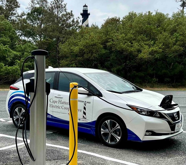 Electric car connected to EV charging station