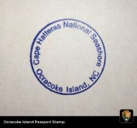 Blue, circular stamp that reads, "Cape Hatteras National Seashore, Ocracoke Island, NC."