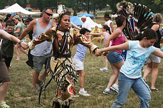 Native dancers invite audience participation in a circle dance during Patuxent Encounters event at Jefferson Patterson Park and Museum, 2007 (Photo by M.Sisler)