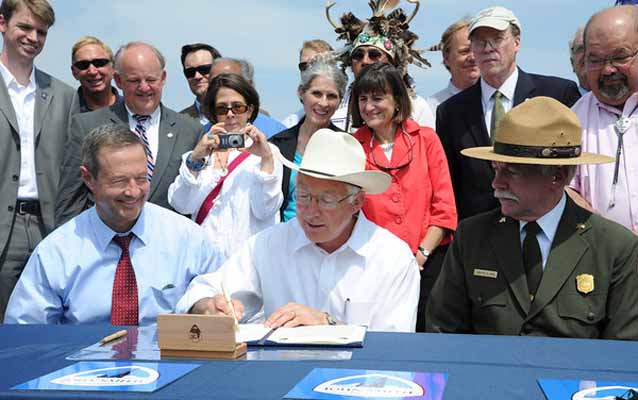 Secretary Salazar signing the designation document