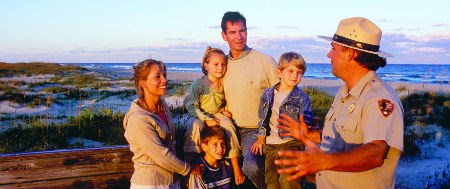 A ranger speaks with a family.