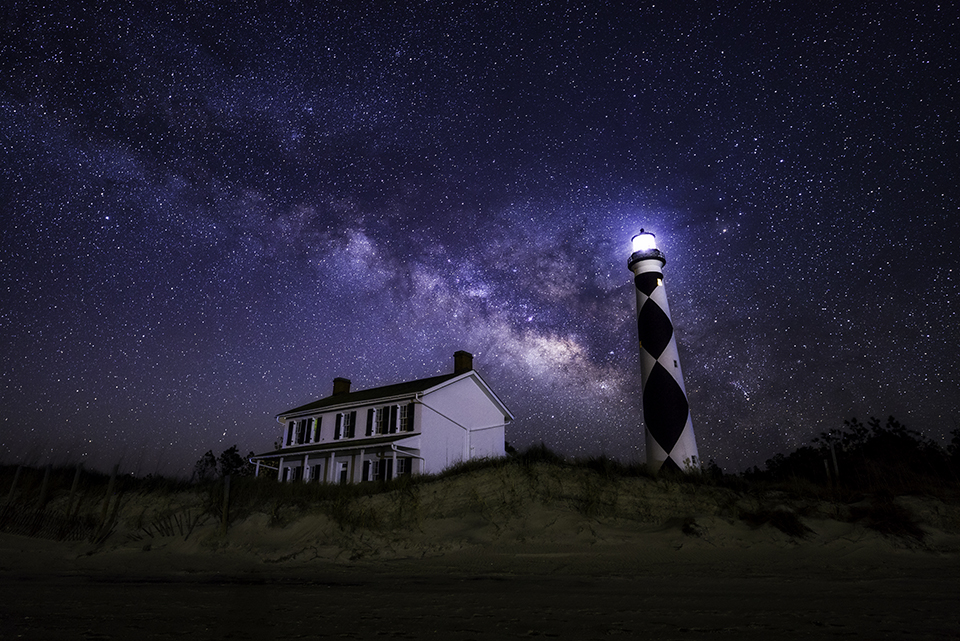 Milky Way in the sky over the Cape Lookout Lighthouse and Keepers' Quarters
