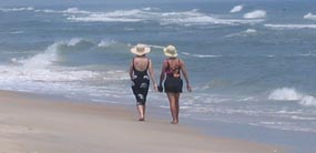strolling along the beach strolling along the beach