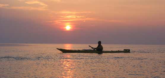 Paddling at sunset Paddling at sunset