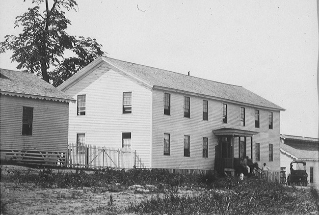A wooden building that served as a government office at the Home for Colored Refugees