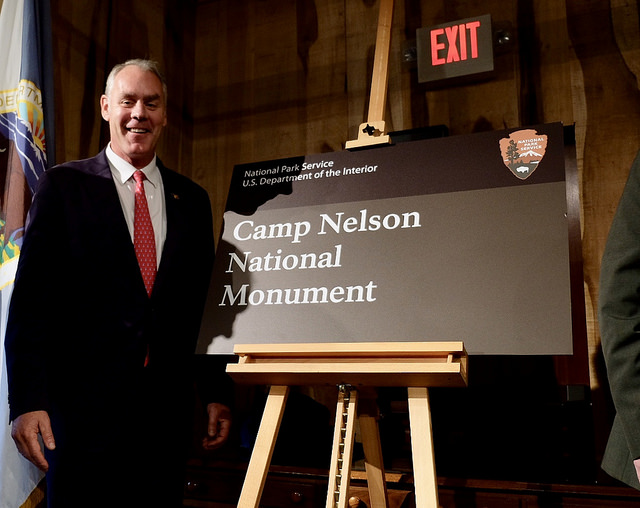 Secretary of the Interior Ryan Zinke and new Camp Nelson National Monument sign