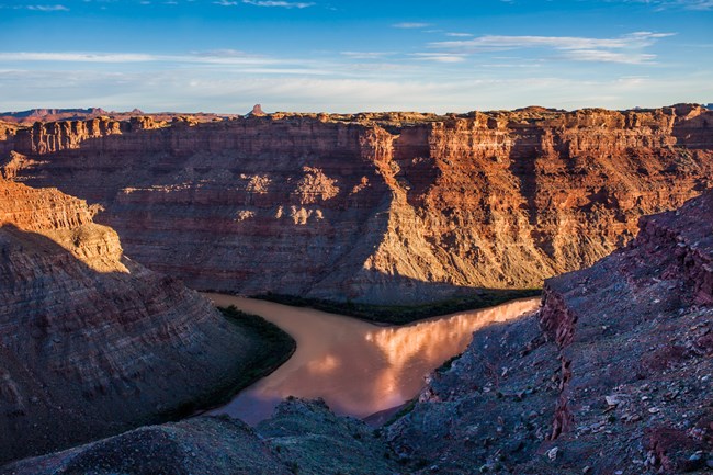 Two large rivers meet deep in a canyon.