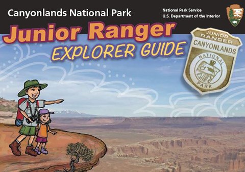 a drawing of two people standing on a cliff edge. text reads junior ranger explorer guide