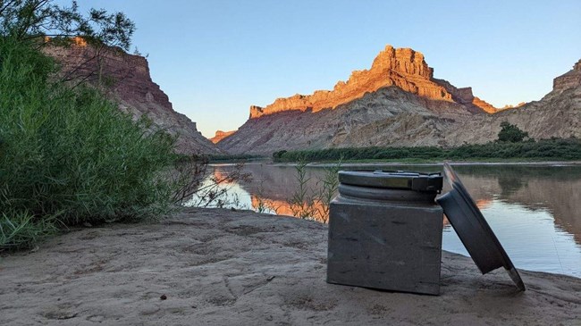 Metal toilet system at a river camp