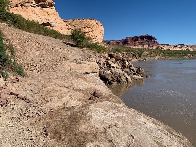 Primitive boat ramp with rocks and dirt on a steep angle