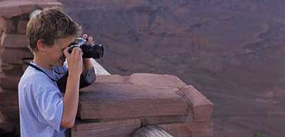 photo: An amateur photographer taking pictures at one of the Island in the Sky's many overlooks photo: An amateur photographer taking pictures at one of the Island in the Sky's many overlooks