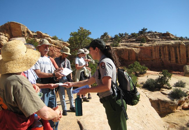 A ranger leads a guided hike