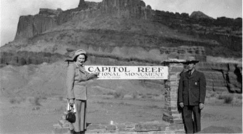 Kellys at old park entrance sign Harriett and Charles Keely stand by the old park entrance sign