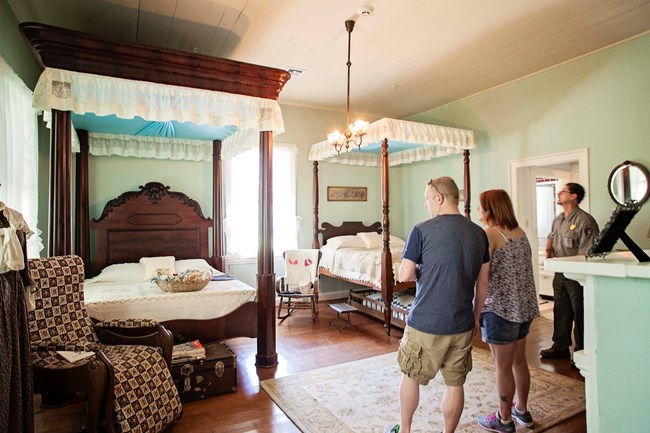 A ranger leads a tour in the children's room.