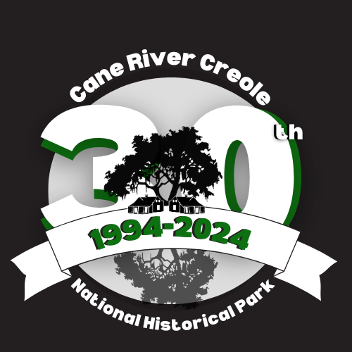 Come celebrate with us! A Large number 30 surrounded by trees and buildings.