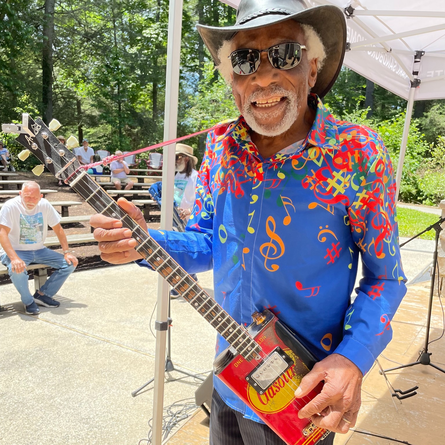 Mac Arnold Blues musician on stage with guitar