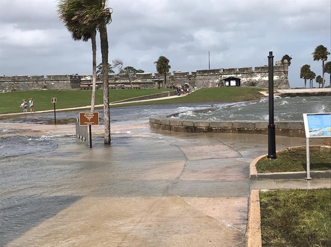 Taken on September 21, 2020 of water coming over the sea wall and flooding the park lawn and parking lot.