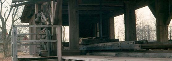 Reconstructed sawmill at Owens Creek Campground shows gears.