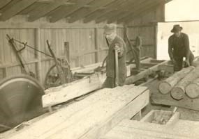 Cutting lumber at the WPA sawmill.