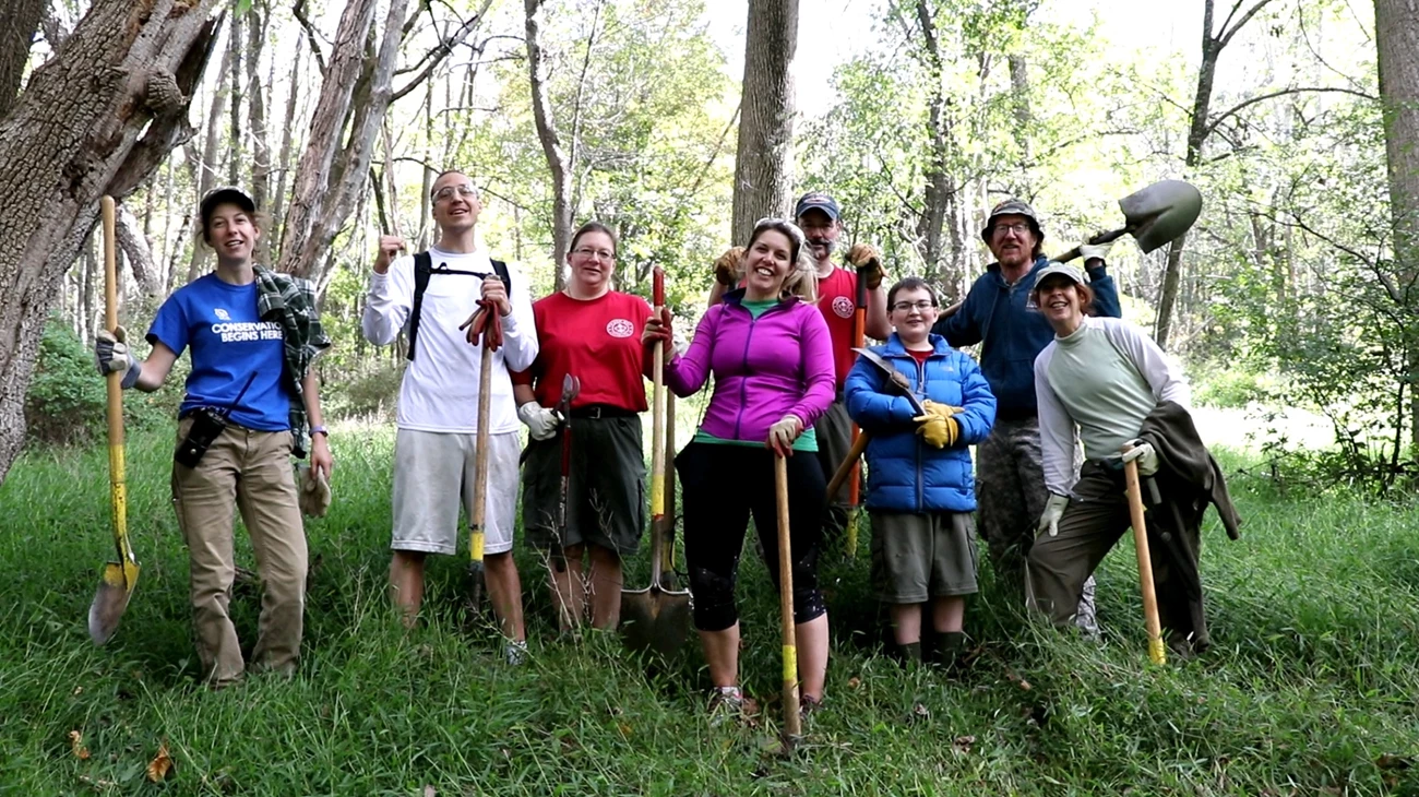A successful National Public Lands Day 2017! A group of volunteers holding shovels and loppers on National Public Lands Day