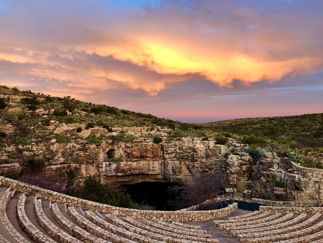 a photo of the natural entrance set against a beautiful sunrise