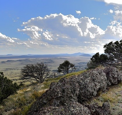 Volcanic rock and volcanoes seen from the top of the Crater Rim Trail