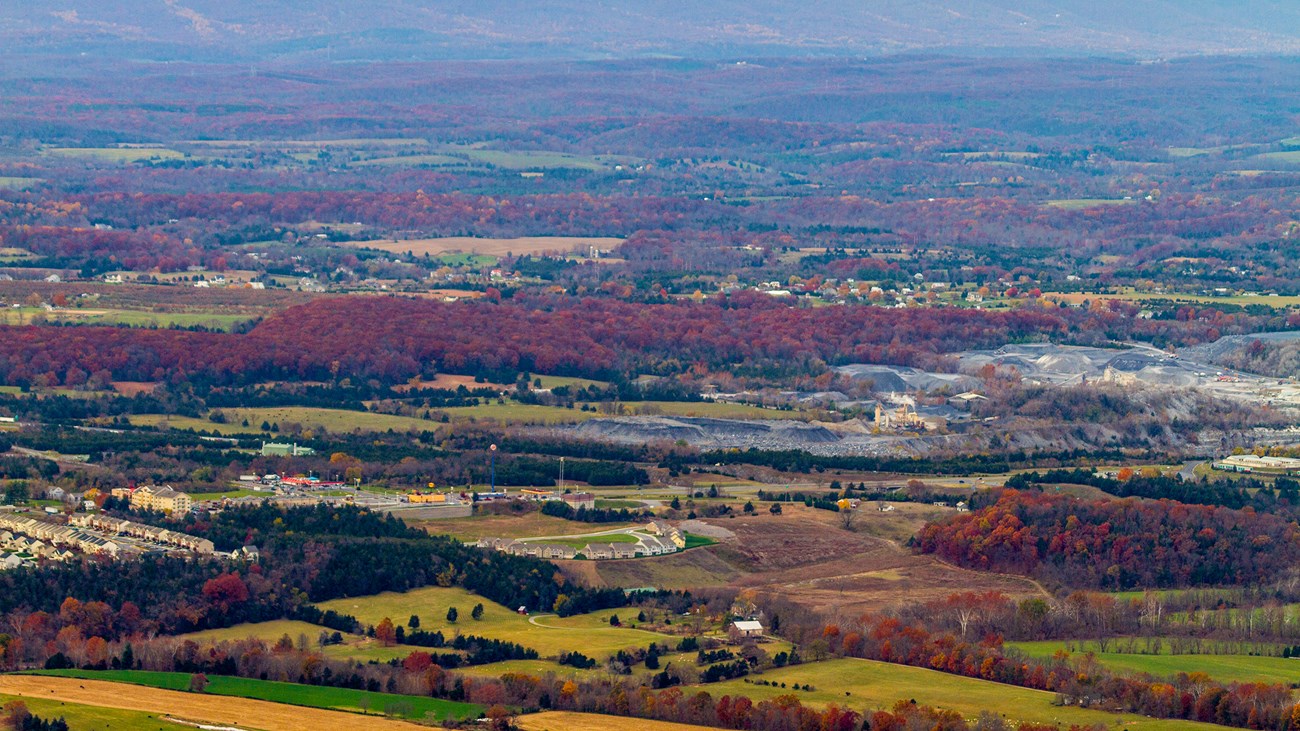 Signal Knob View of the Valley A mountain view shows a valley of farms, residences, and industry.