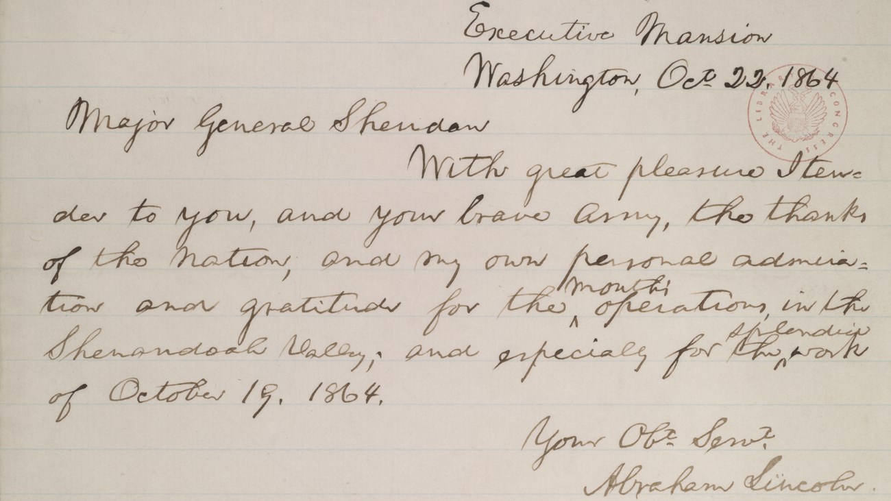 A brief, handwritten letter on lined paper expresses Lincoln's thanks to Sheridan.