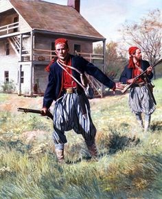 Soldiers in field near house