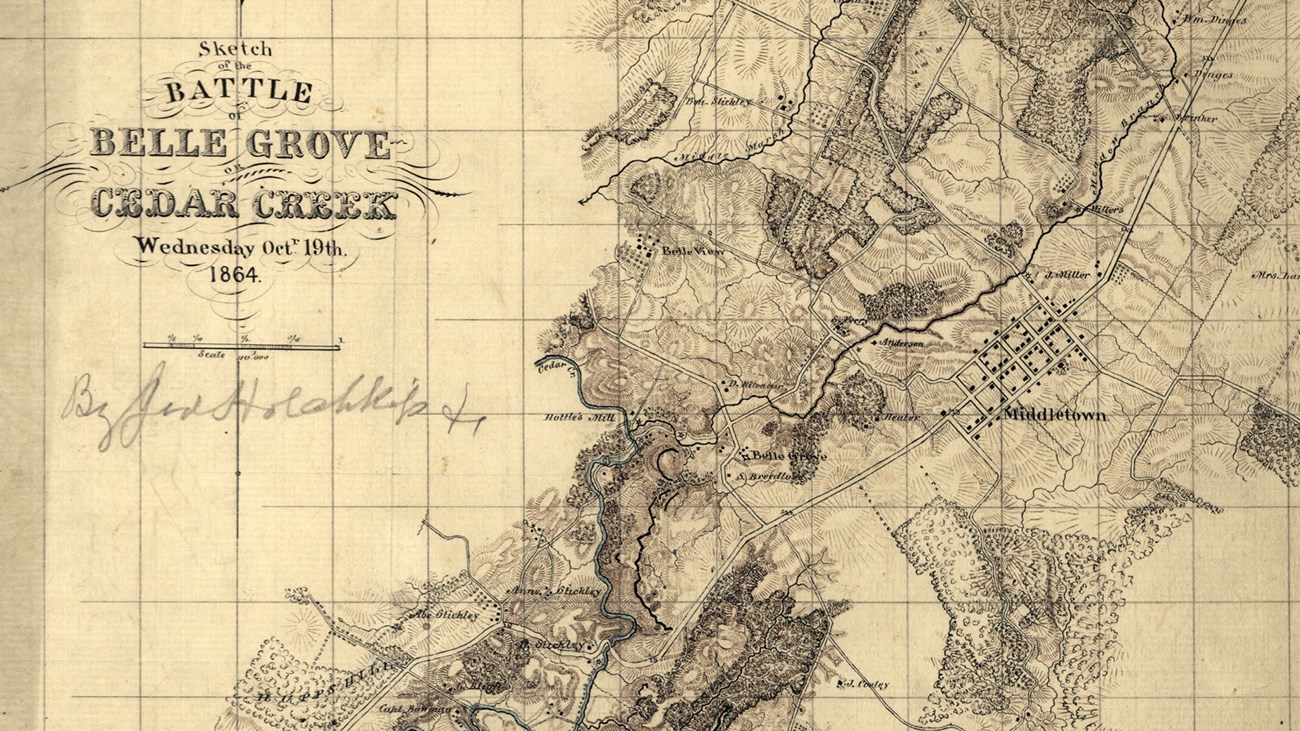 A detailed hand drawn 1800s map labeled Battle of Belle Grove depicts the terrain of the battlefield.