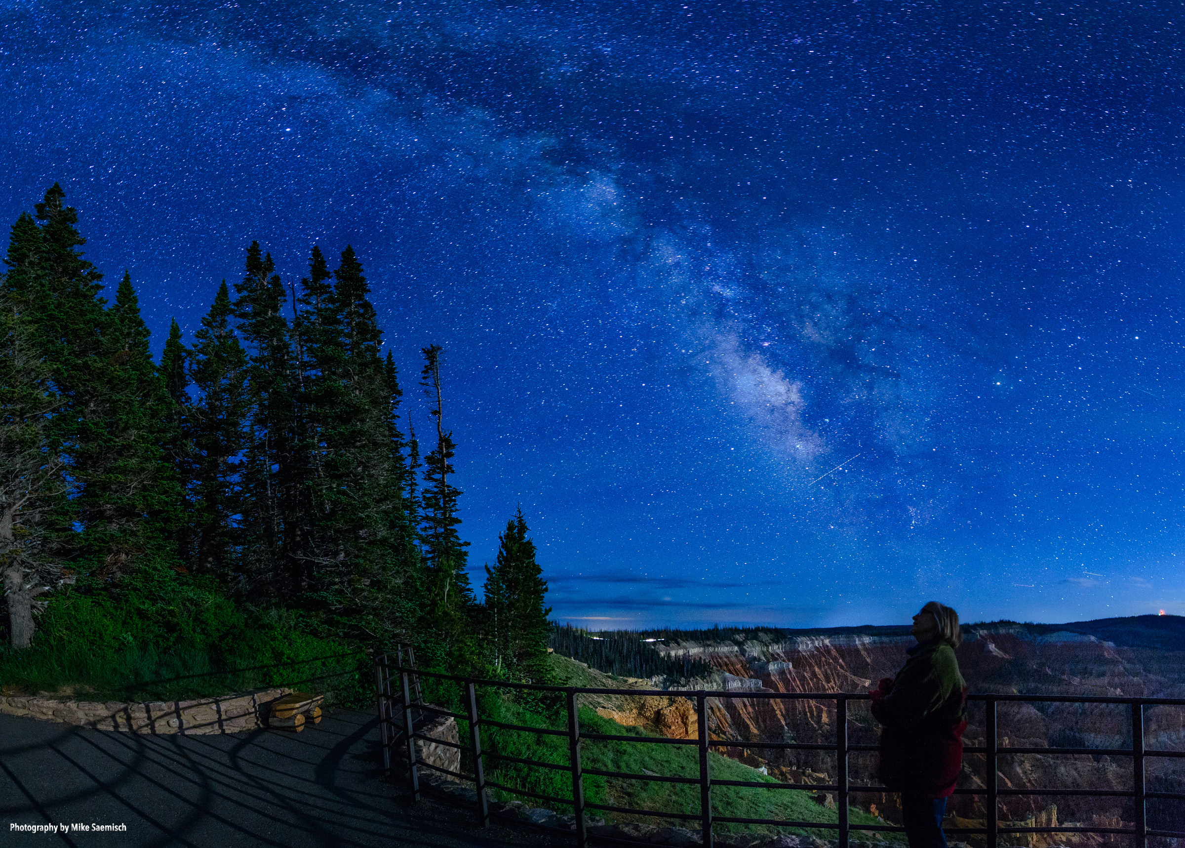 Visitors enjoy views of glittering stars above the Cedar Breaks Ampitheater