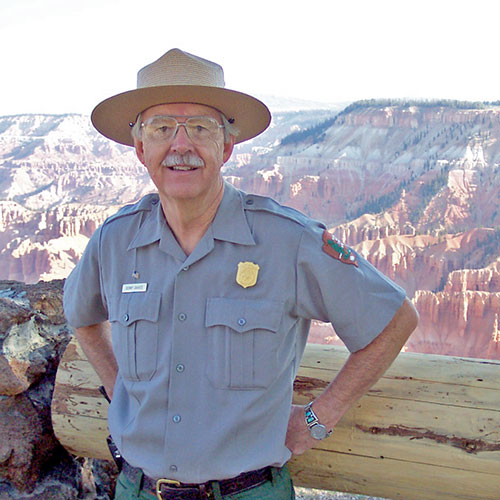 Male park ranger in full uniform on the rim of Cedar Breaks National Monument. Male park ranger in full uniform on the rim of Cedar Breaks National Monument.
