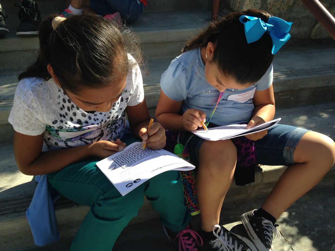 students with fill in junior ranger booklets