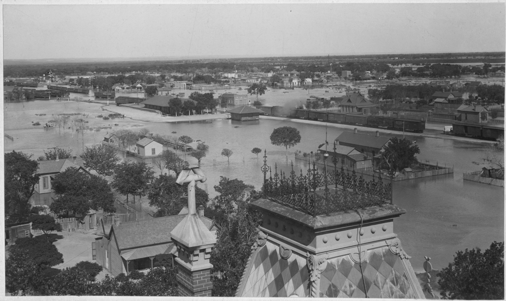 Black-and-white panoramic photo of a flooded downtown El Paso taken from the top of a tall building.