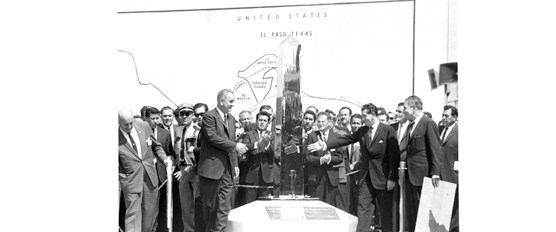 Presidents Lyndon Baines Johnson and Adolfo López Mateos of Mexico shake hands on the middle of the international bridge between El Paso and Ciudad Juarez, September 25, 1964.