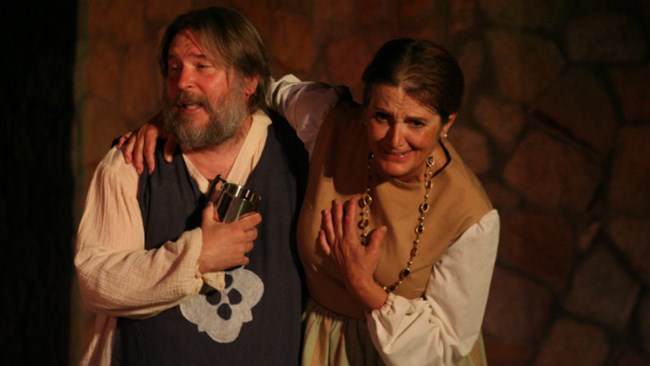 Close-up of male and female characters in a Siglo de Oro period play Close-up of male and female characters in a Siglo de Oro period play