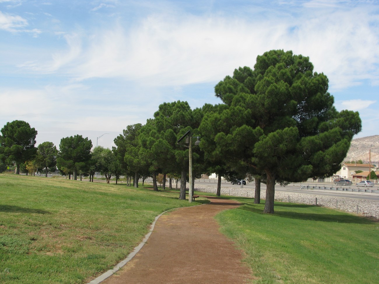 Section of train along north side of park.