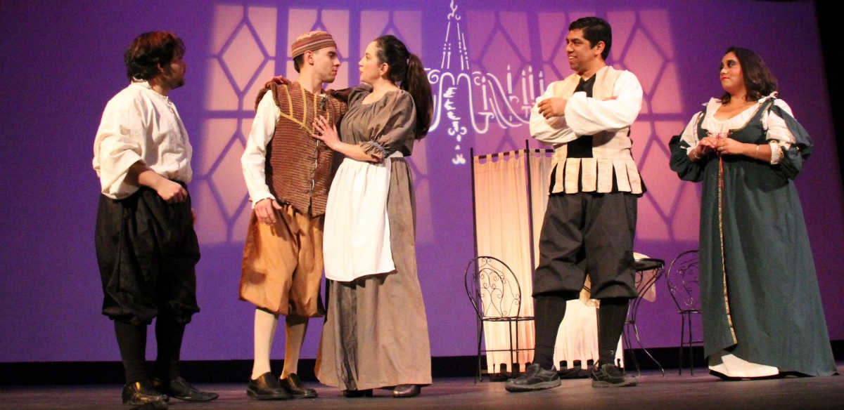 Actors in costumes on stage Actors in costumes on stage