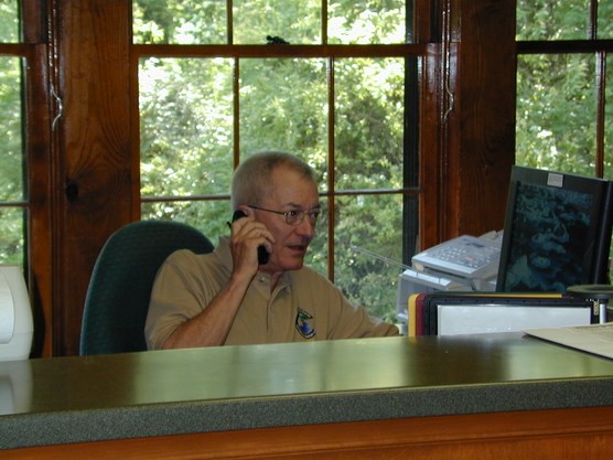 Volunteer Jack Switzer at the Visitor Center Front Desk