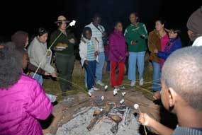 Enjoying the campfire.