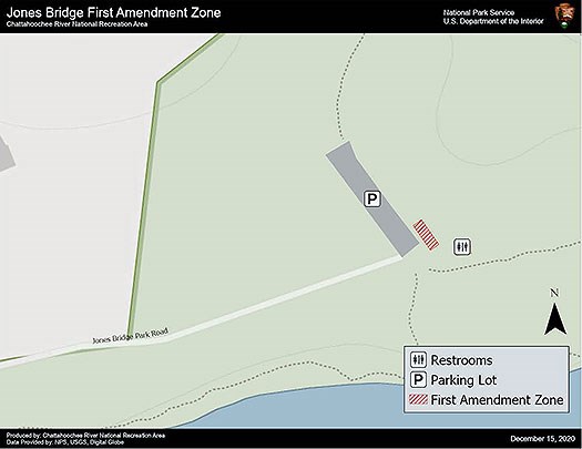 First Amendment Zone is the grassy area between the restroom facility and the parking lot.