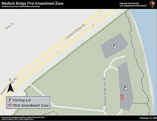 First Amendment Zone is four parking spaces to the left as you enter the first parking lot.