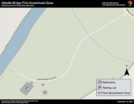 First Amendment Zone is the grassy area between the access road and the restroom facility.